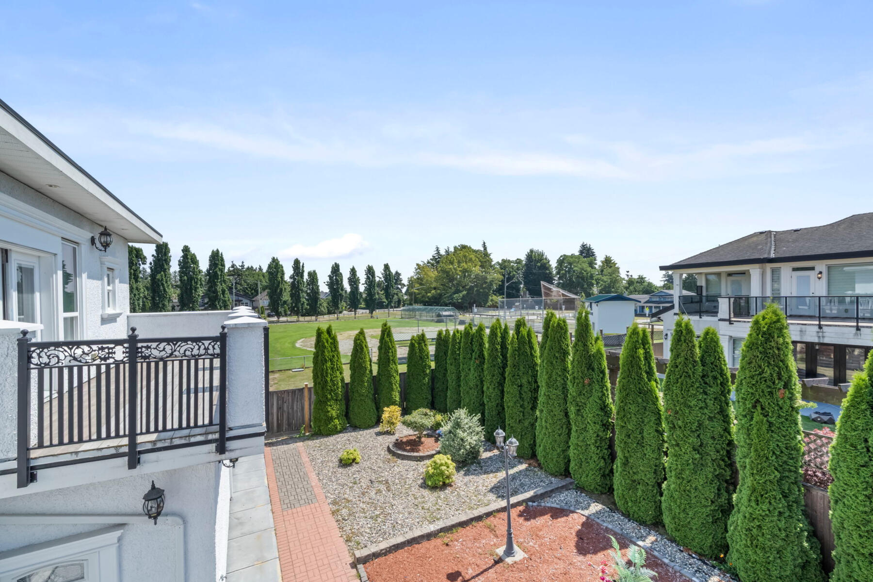 THE OUTDOORS FOLLOWS YOU UPSTAIRS. Three upper-level balconies overlook the park, giving the bedrooms their own connection to the outdoors.